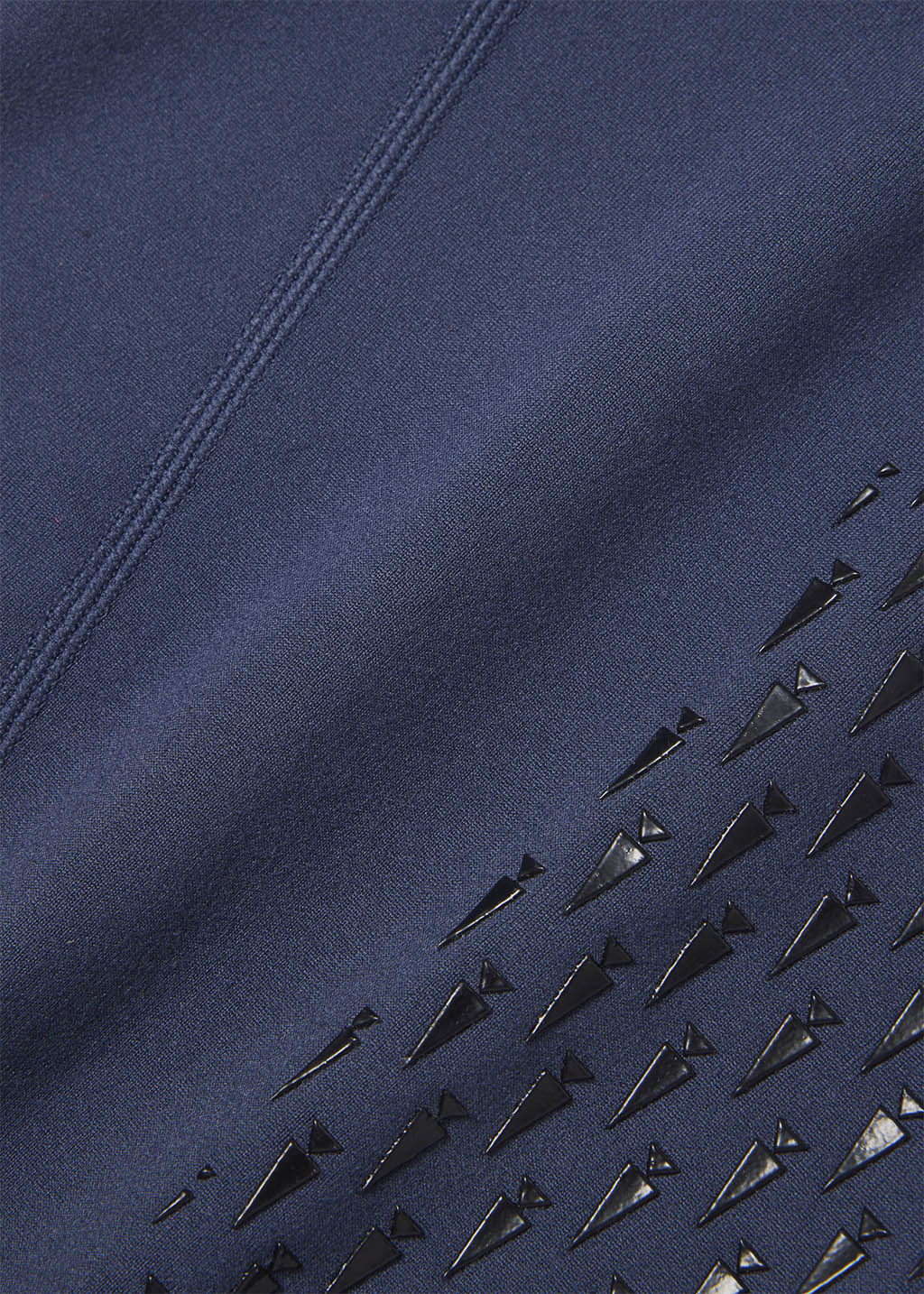 Detailed view of the Kerrit Sticks™ Silicone knee patch on the Free Style Knee Patch Pocket Tight, offering enhanced grip.