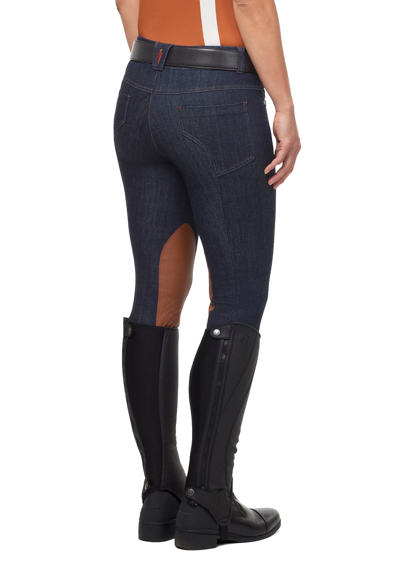 Back view on model of the Stretch Denim Knee Patch Breech in denim, displaying contrast stitching and slimming back pockets that offer a flattering appearance