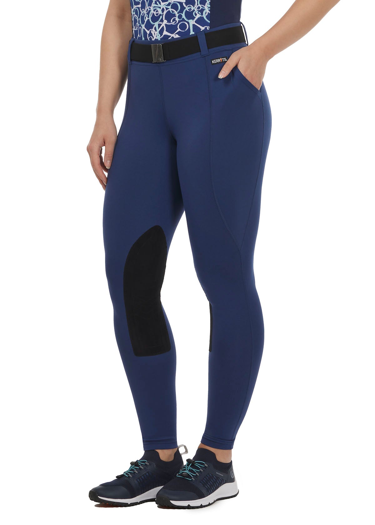 Front view of the Performance Knee Patch Pocket Riding Tight in Lapis, highlighting the sleek design and mid-rise waistband.