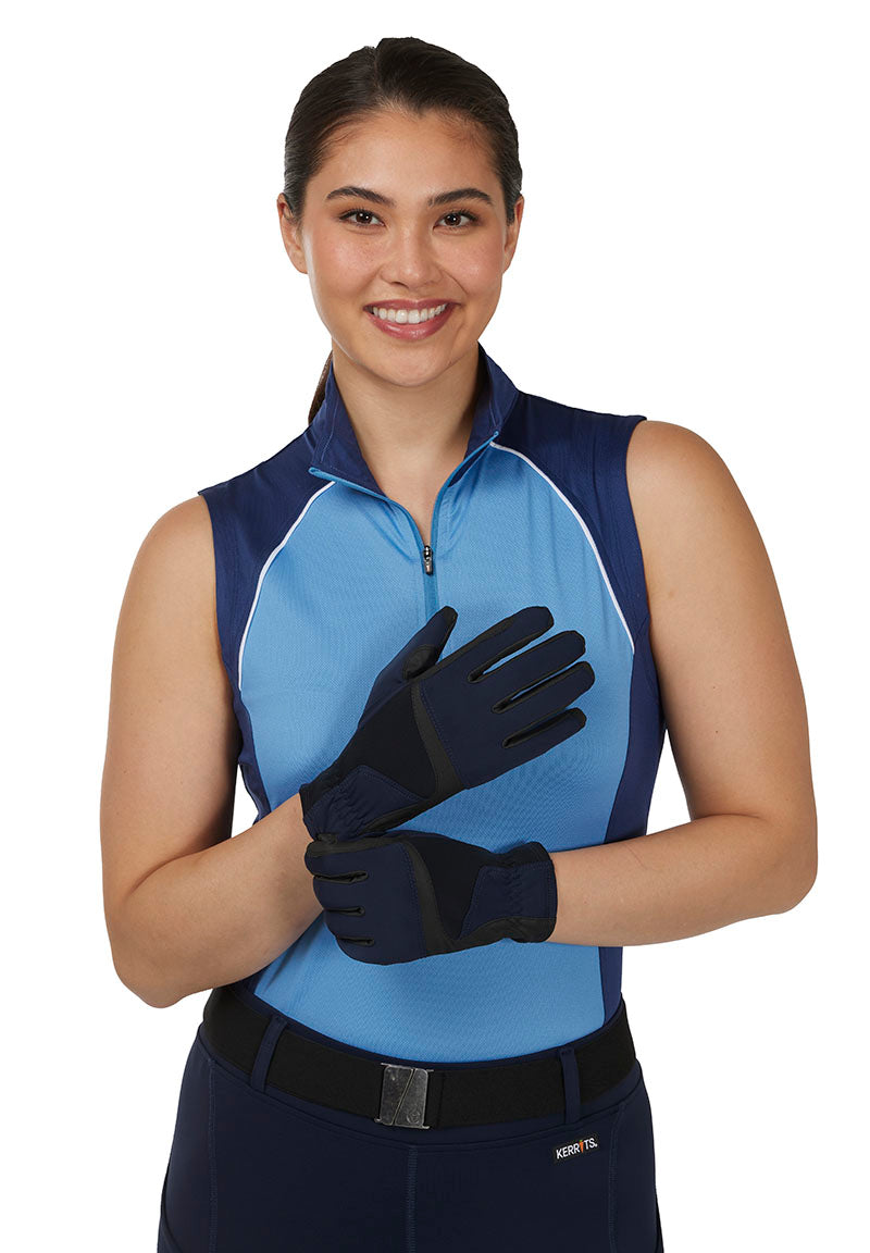 Model wearing the Coolcore® Riding Gloves in GalaxyBlue, showing them as a matching part of a full blue riding outfit.
