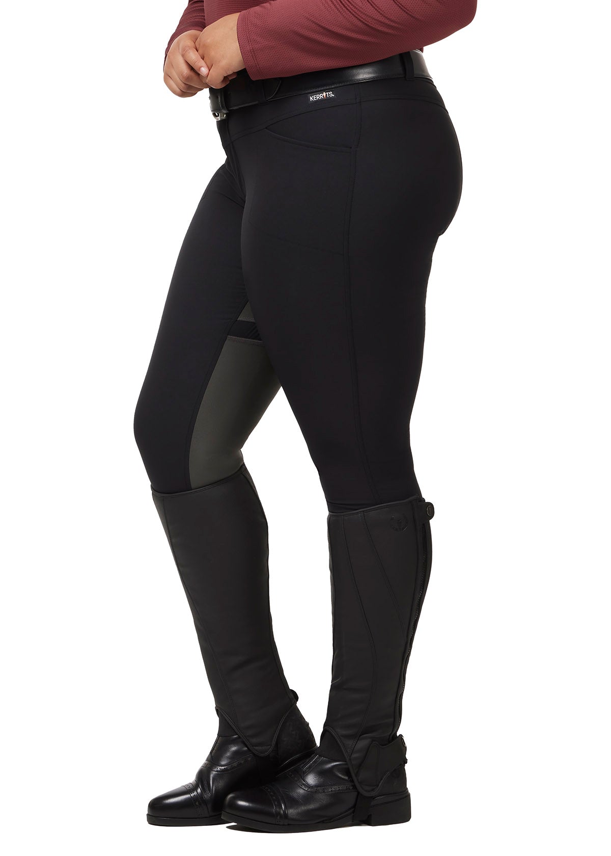 Side view of the Crossover II® Full Seat Riding Breech in Black, emphasizing the tailored fit and sleek design with a water-resistant finish.