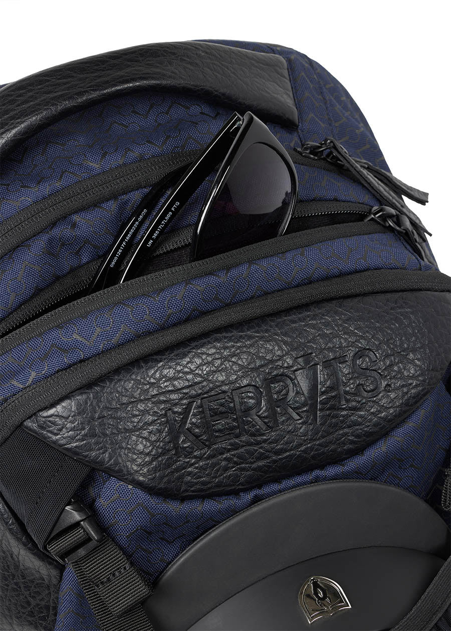 Top view of the Kerrits EQ Backpack in Navy, showing the sturdy handle and zippered main compartment.
