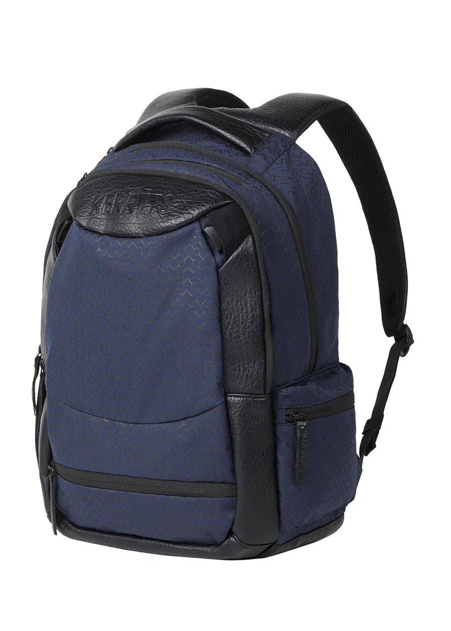 Flat lay of the Kerrits EQ Backpack in navy, presenting the front design with organized compartments.