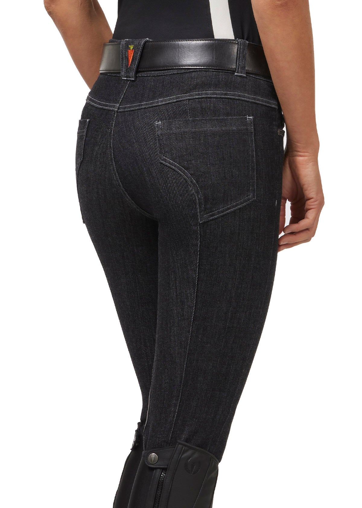 Back view on model of the Stretch Denim Knee Patch Breech in denim, displaying contrast stitching and slimming back pockets that offer a flattering appearance