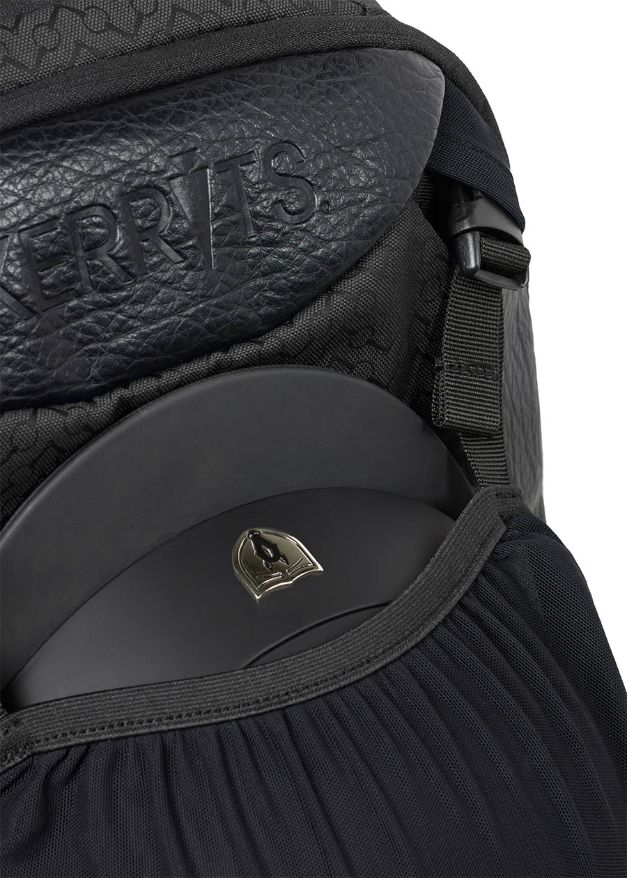 Close-up of the Kerrits EQ Backpack fabric, emphasizing the high-quality craftsmanship and branding.