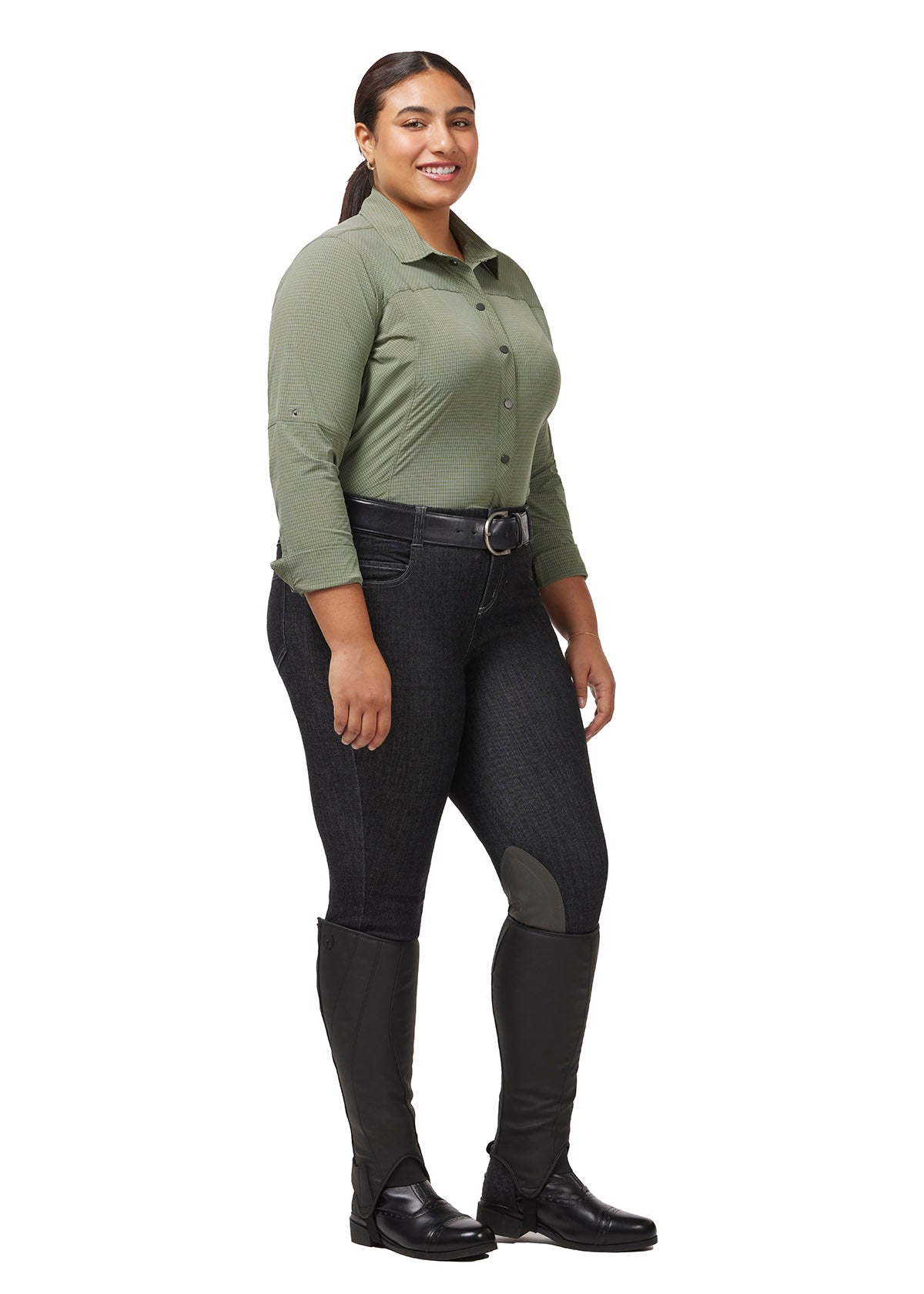 Full body front view on model of the Stretch Denim Knee Patch Breech paired with a long sleeve riding top