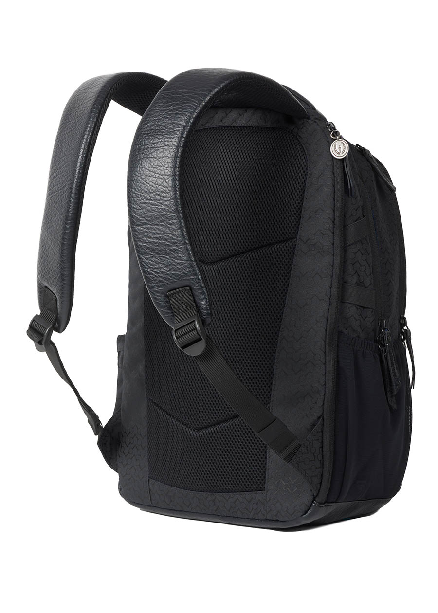 Flat lay of the Kerrits EQ Backpack, showing the padded back panel and adjustable straps.
