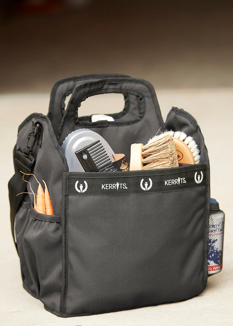 Kerrits Barn Caddy organized neatly in a tack room, showcasing its role in keeping supplies tidy.