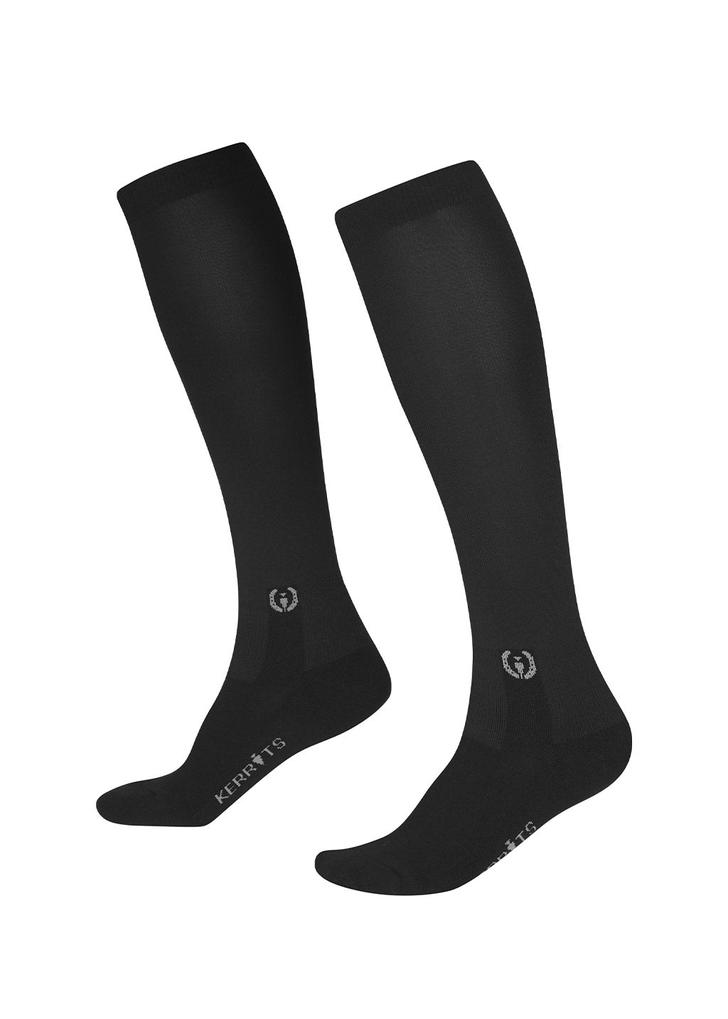 Flat lay of the socks, displaying the solid-colored calf section and footbed