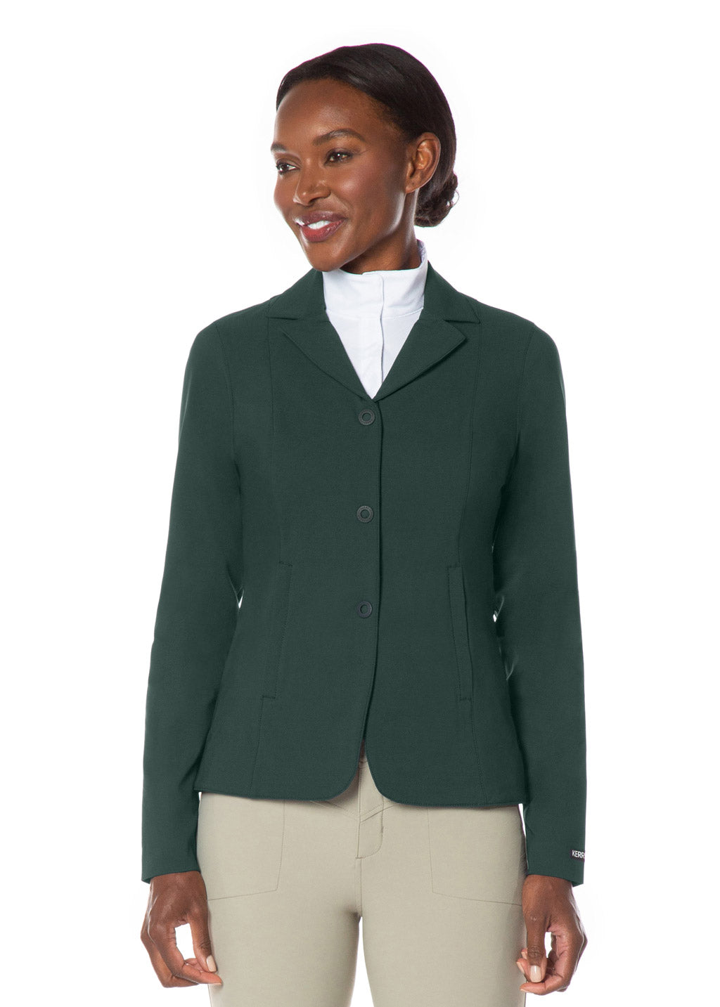 Front view on model of the Stretch Competitor Koat in green, featuring a hidden front zipper with snap closures for a smooth, streamlined appearance