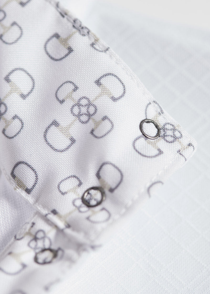 Close-up of the Bit of Luck equestrian print which lines the interior of the collar for equestrian flair.