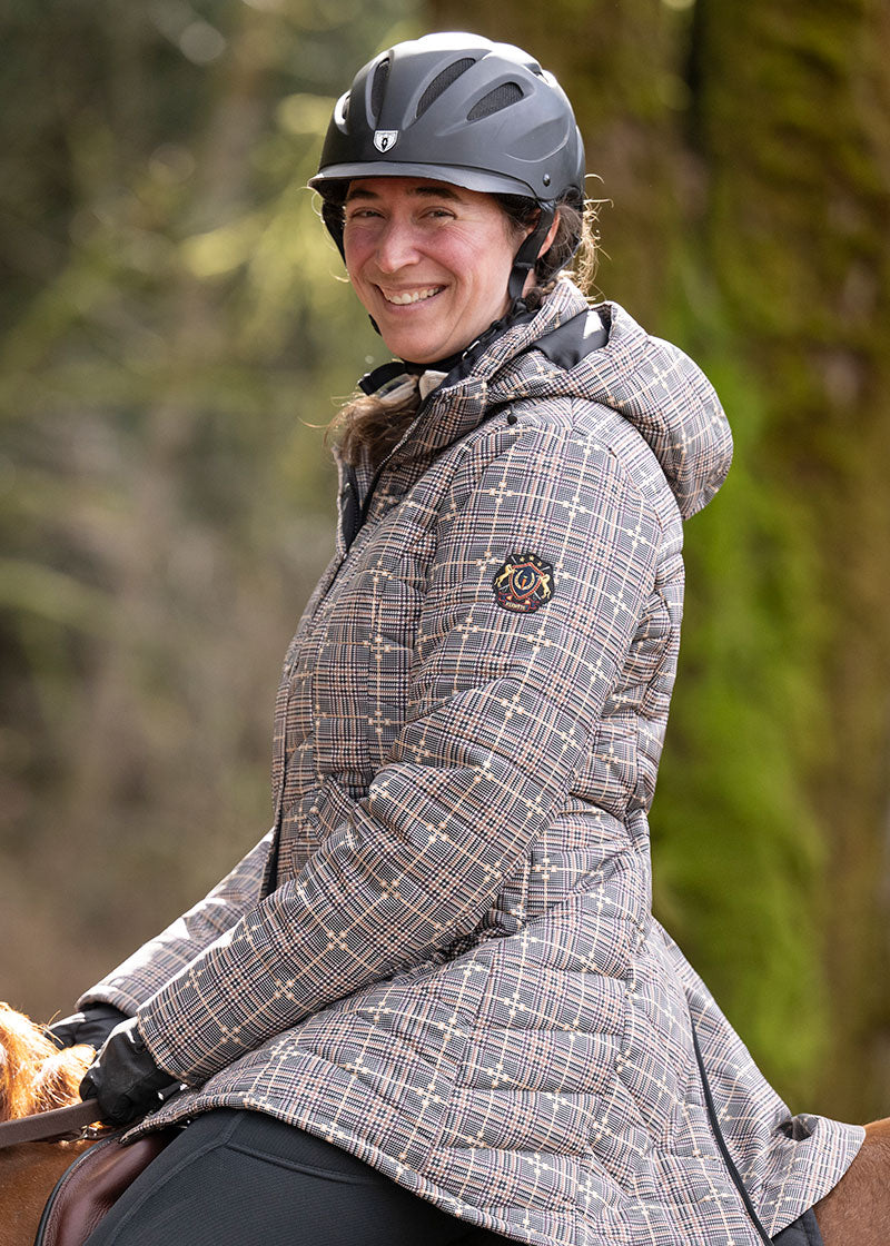 Side view of the Elevation Insulated Winter Equestrian Jacket in EQ Plaid, displaying the mid-thigh length and removable, insulated hood.