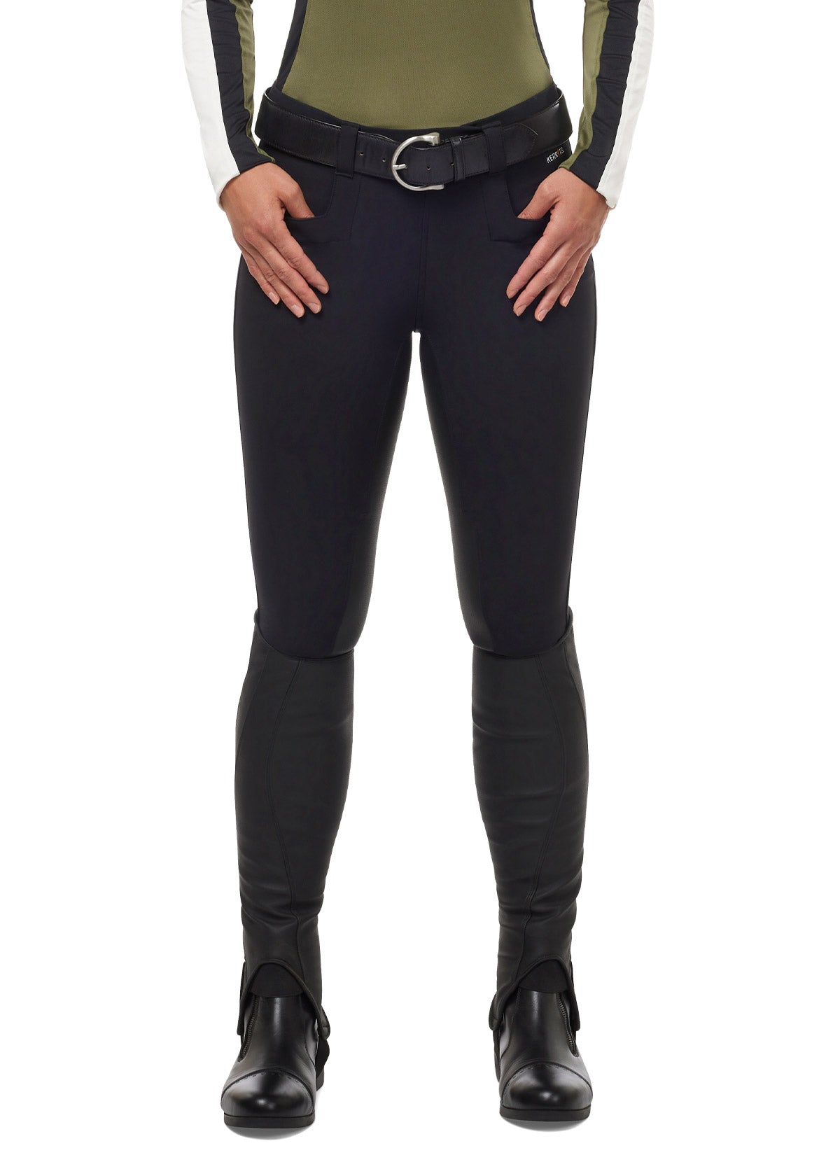 Model wearing the Kerrits GripTek™ II Full Seat Breech in black, highlighting the sleek fit and hidden zip closure.