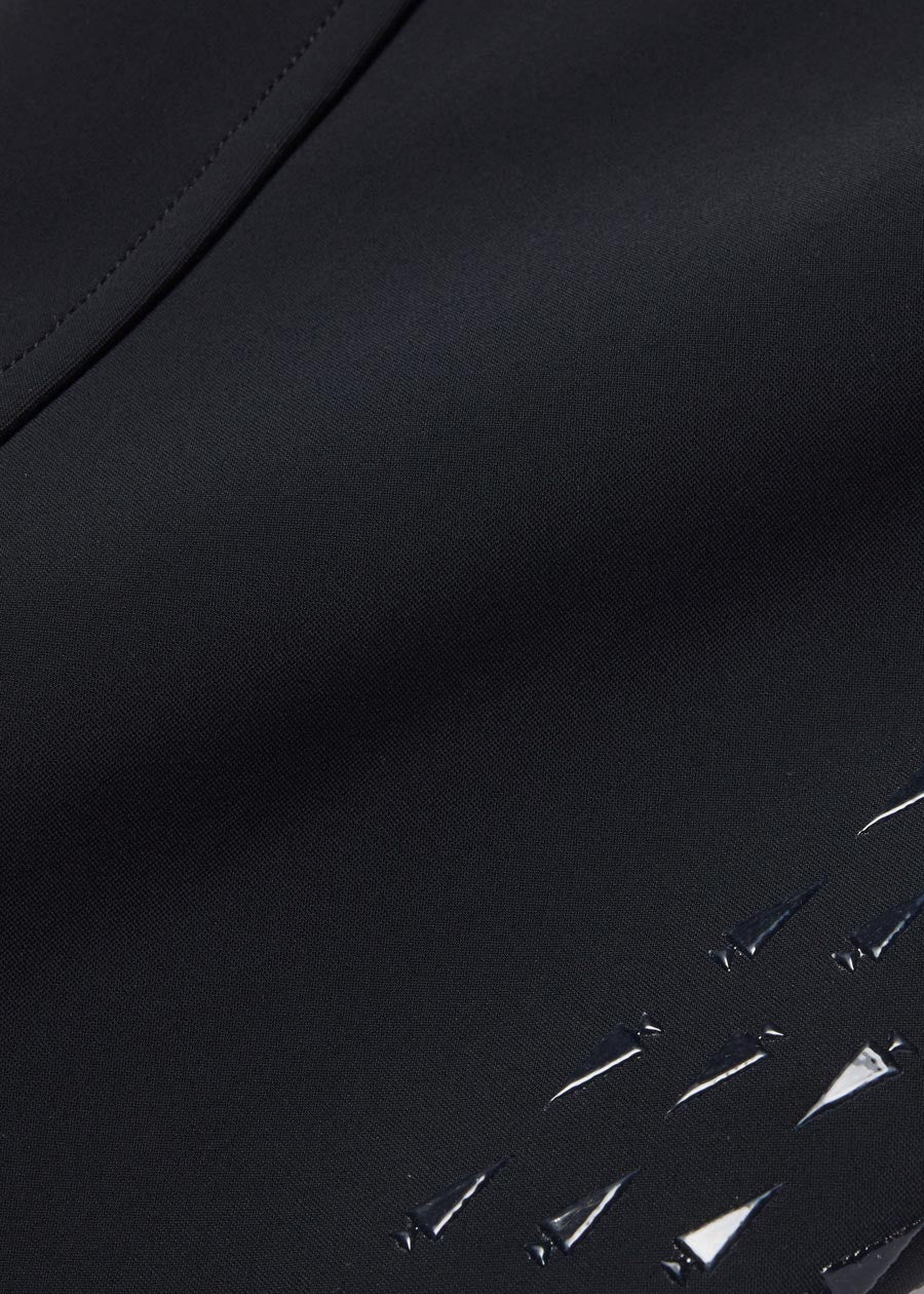 Detailed view of the ThermaLux™ knit fabric with a brushed interior, providing extra warmth during cooler seasons.