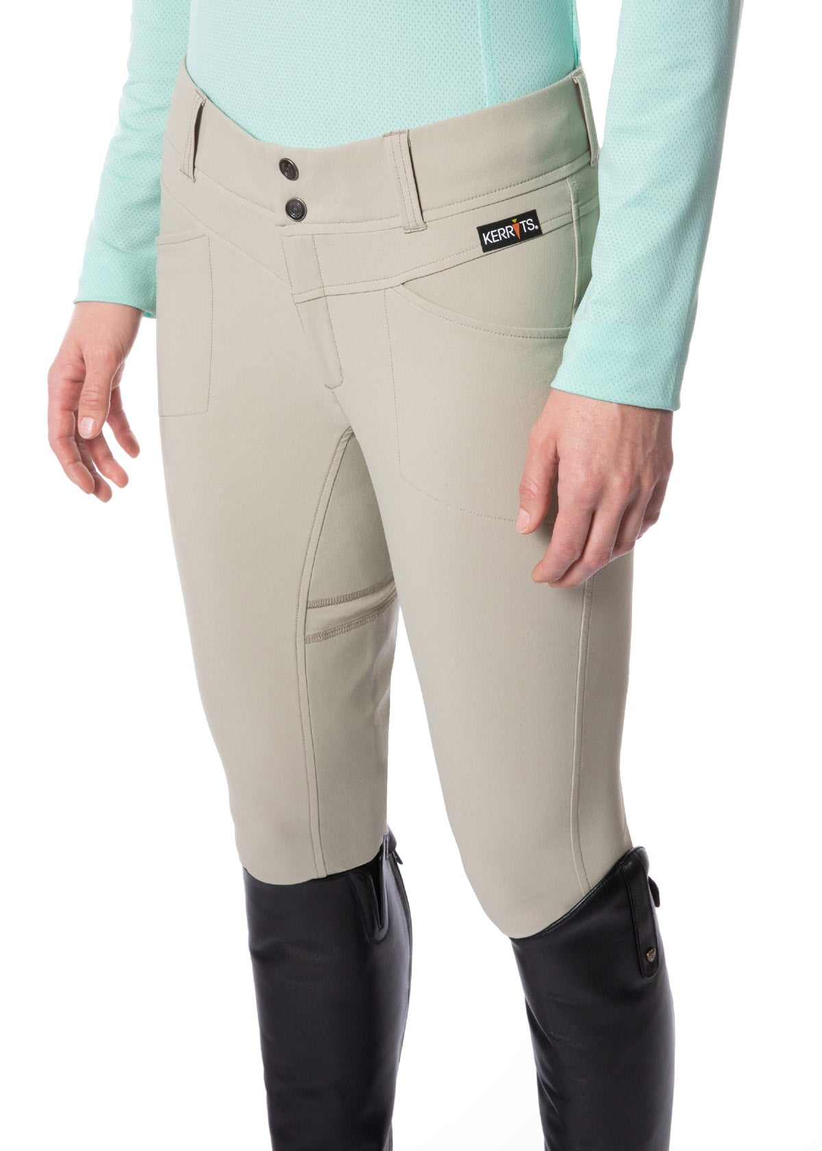 Detailed view of the 2-inch waistband with belt loops on the Crossover II® Full Seat Riding Breech, offering a tailored, secure fit.