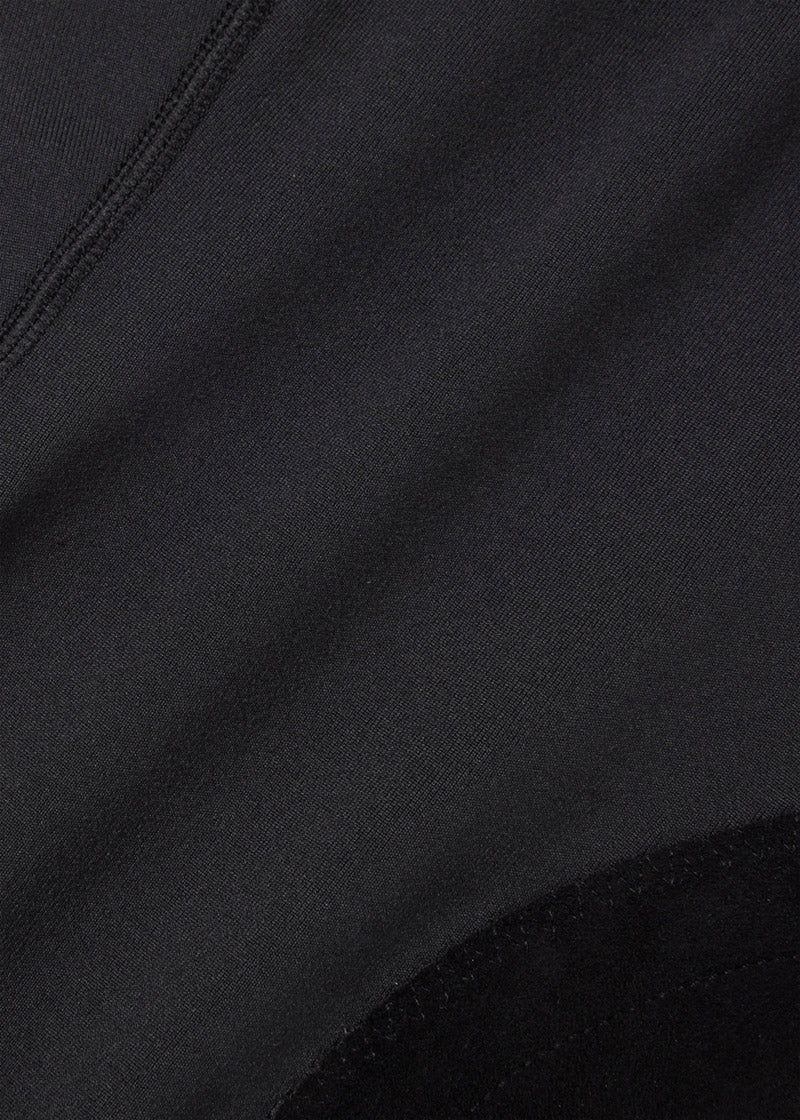 Detailed view of the StretchLite™ Suede knee patch and the super soft Fabrisuede Tactel® on the Performance Knee Patch Pocket Riding Tight.