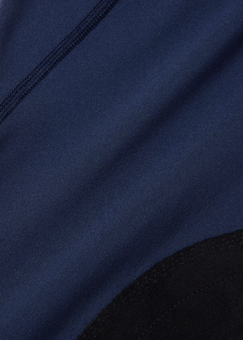 Detailed view of the StretchLite™ Suede knee patch and the super soft Fabrisuede Tactel® on the Performance Knee Patch Pocket Riding Tight.