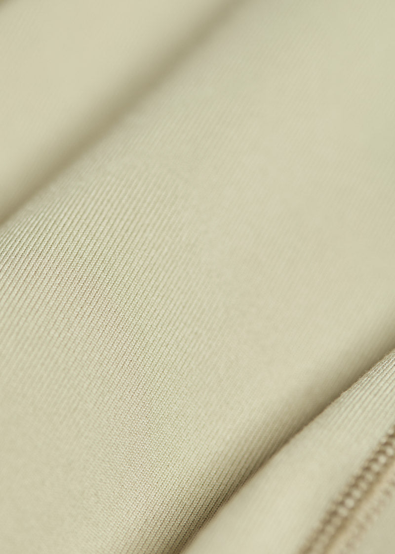 Detailed view of the super soft Fabrisuede Tactel® in Tan on the Performance Knee Patch Pocket Riding Tight.