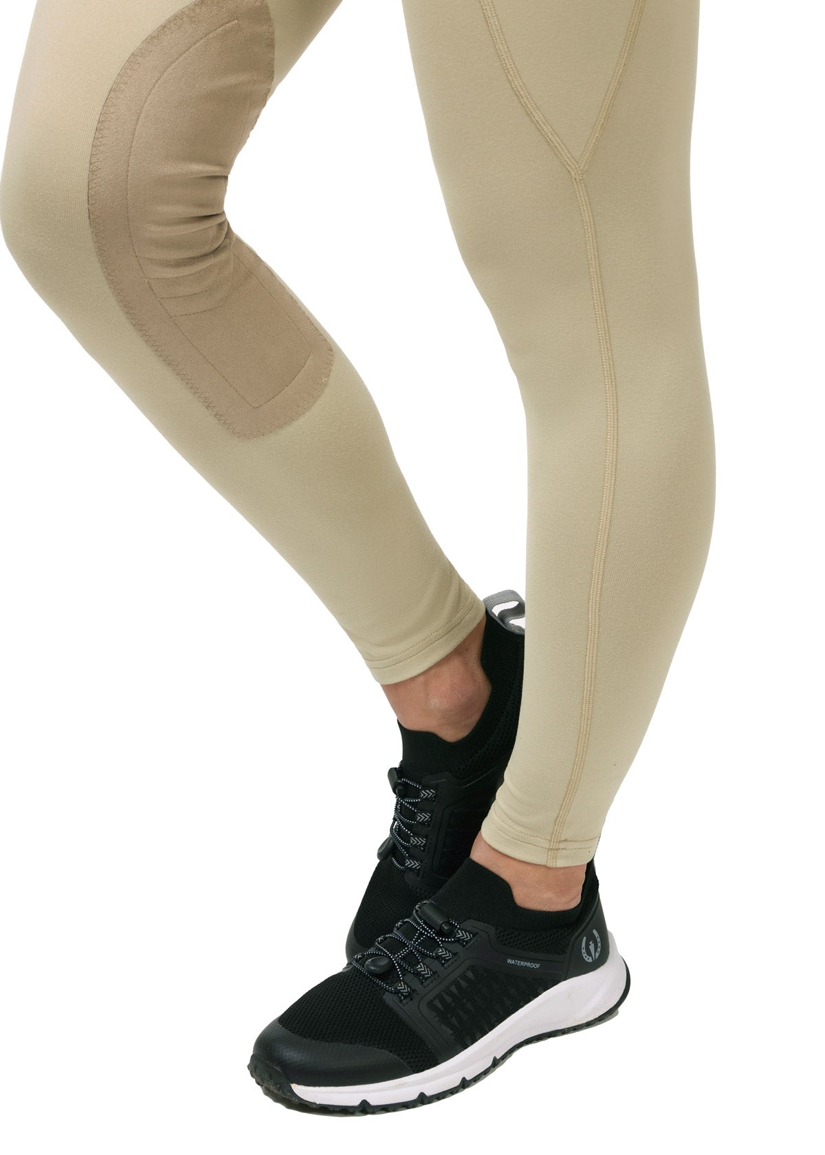 Detailed view of the StretchLite™ Suede knee patch on the Performance Knee Patch Pocket Riding Tight.