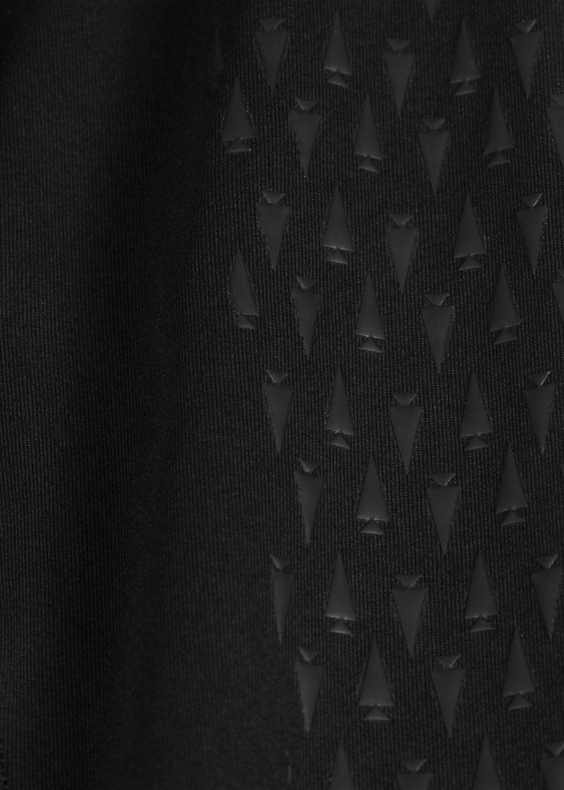 Detail shot of the Kerrit Sticks™ Matte Silicone in Black provides full leg grip with an equal ratio of stretch and breathability.