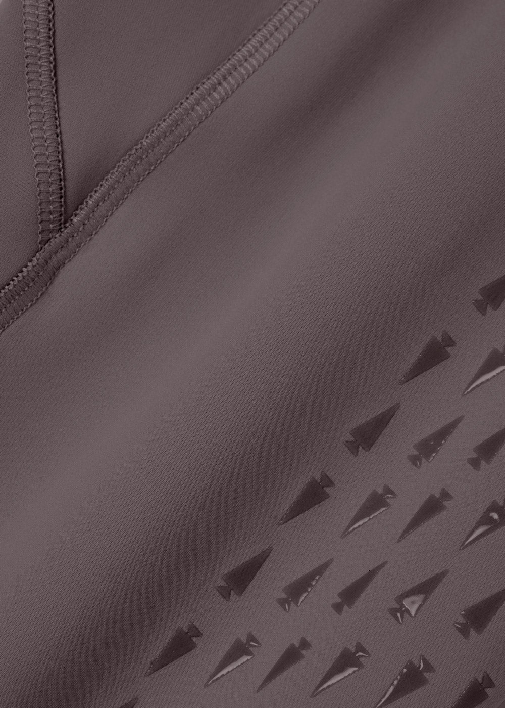 Close-up of the Coolcore® Stretch Interlock fabric of the Coolcore® Full Leg Tech Tight, highlighting its moisture-wicking and cooling properties.