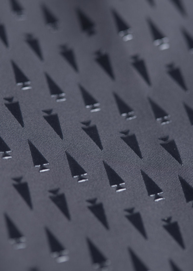 Close-up of the Kerrit Sticks™ silicone full-leg grip on the Coolcore® Full Leg Tech Tight, providing breathable grip from inner thigh to calf.