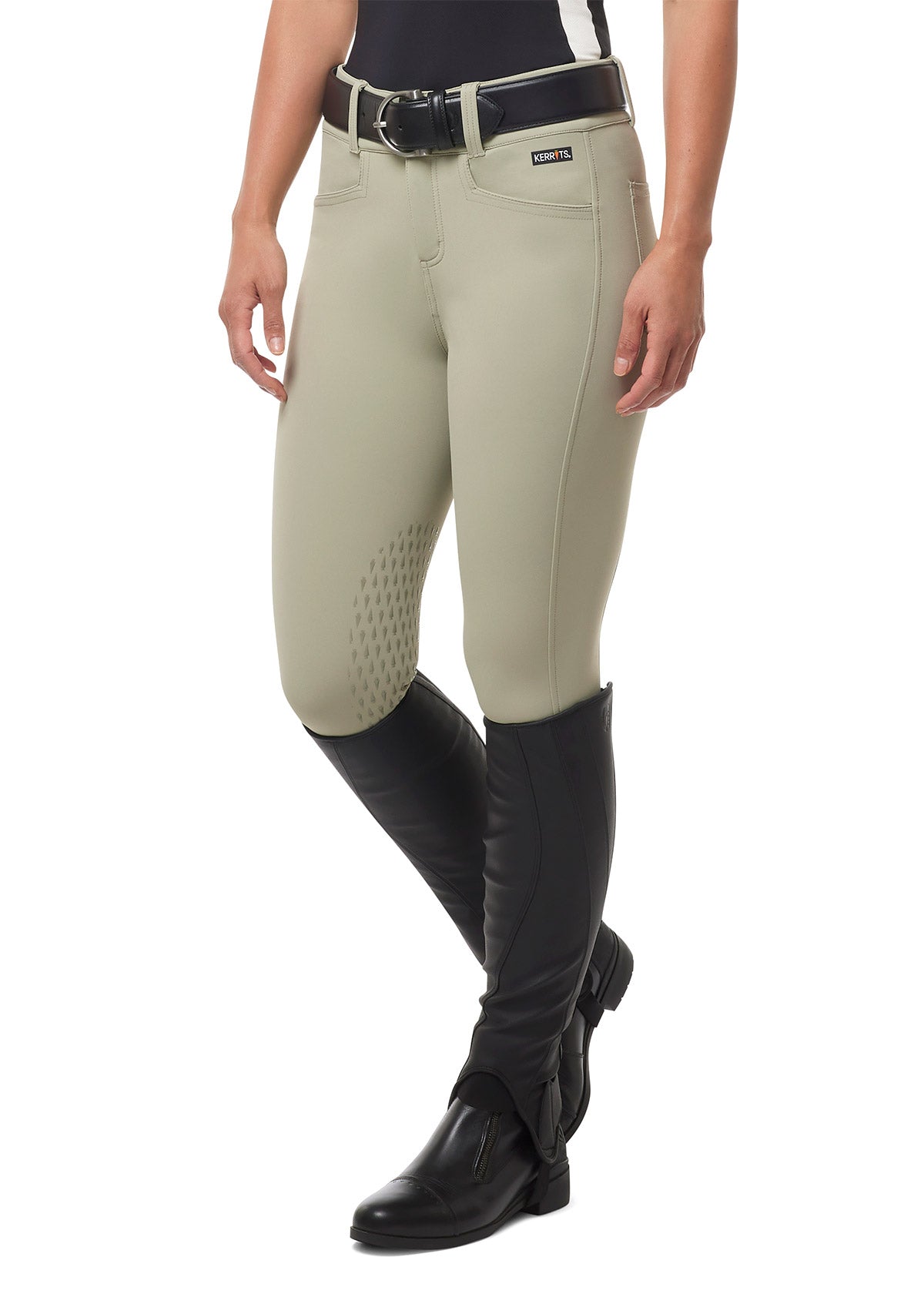 Model wearing the Kerrits K-Flex™ Knee Patch Breech in Sand, showcasing the contoured fit and elegant equestrian style.