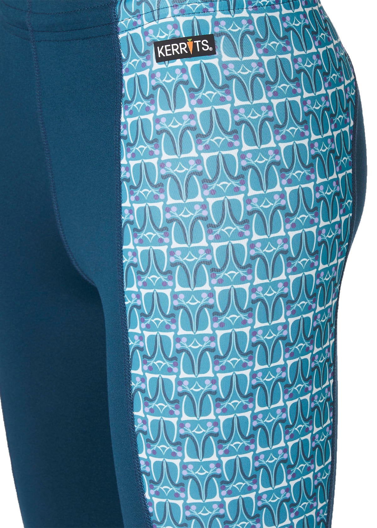 Side profile highlighting the tight's athletic fit and the stretch fabric that ensures mobility in the saddle