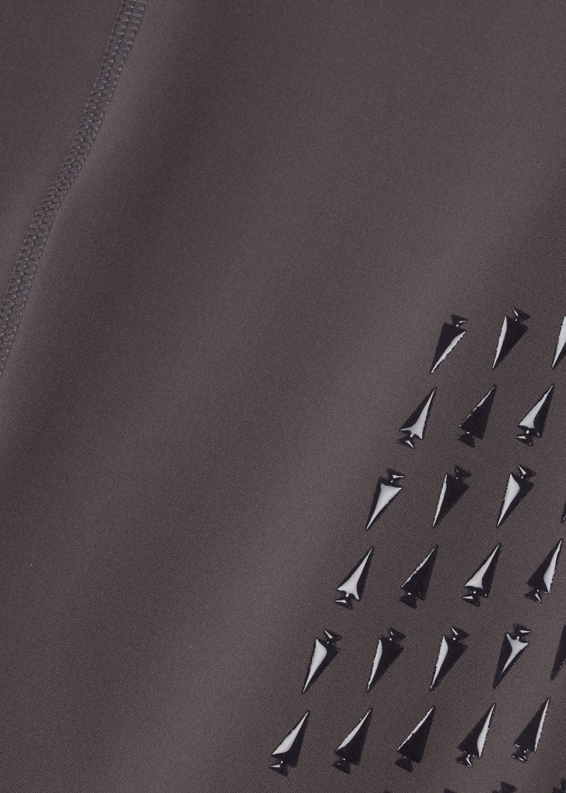 Close-up of the Coolcore® Stretch Interlock fabric, emphasizing its chemical-free fibers engineered to manage and quickly distribute moisture and body heat through thermo-controlled evaporation
