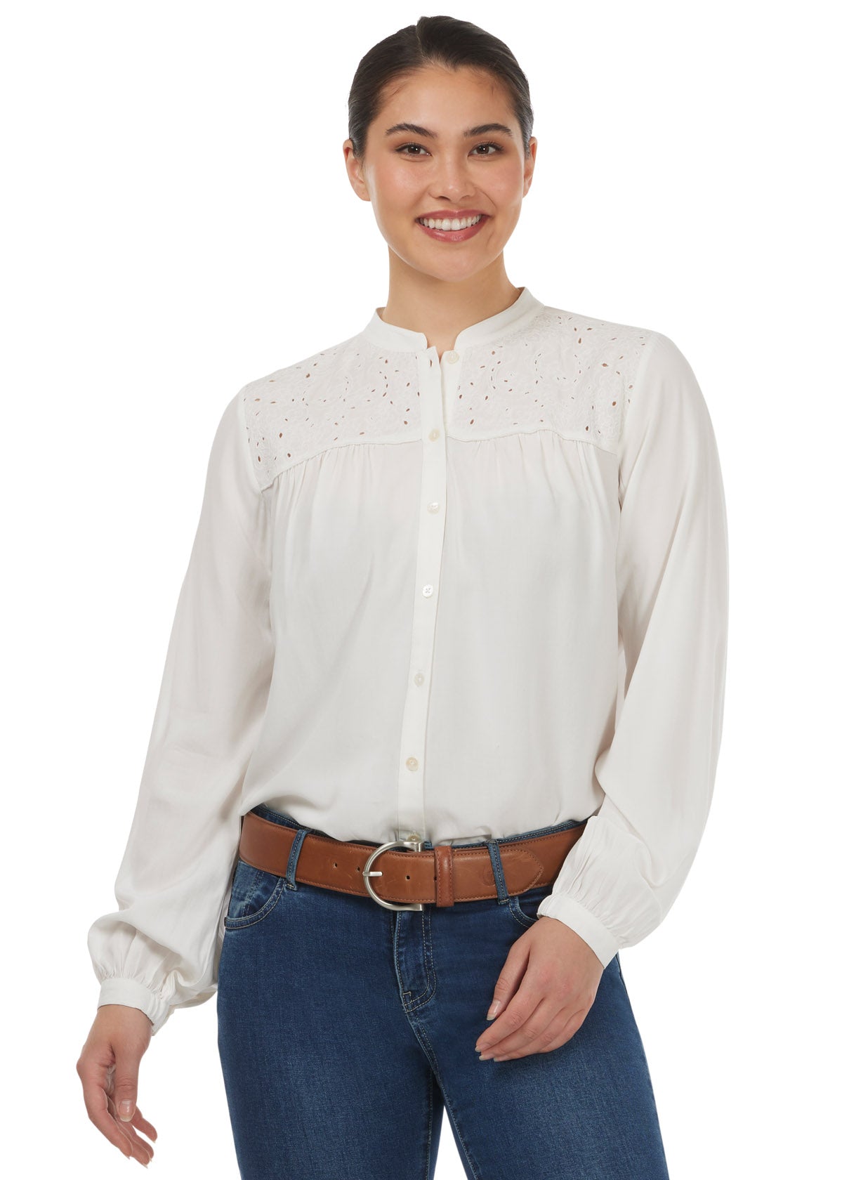 Front view of the Kerrits Hollyhocks & Horseshoes Blouse in Soft White, highlighting the floral horseshoe cutout embroidery on the front yoke.