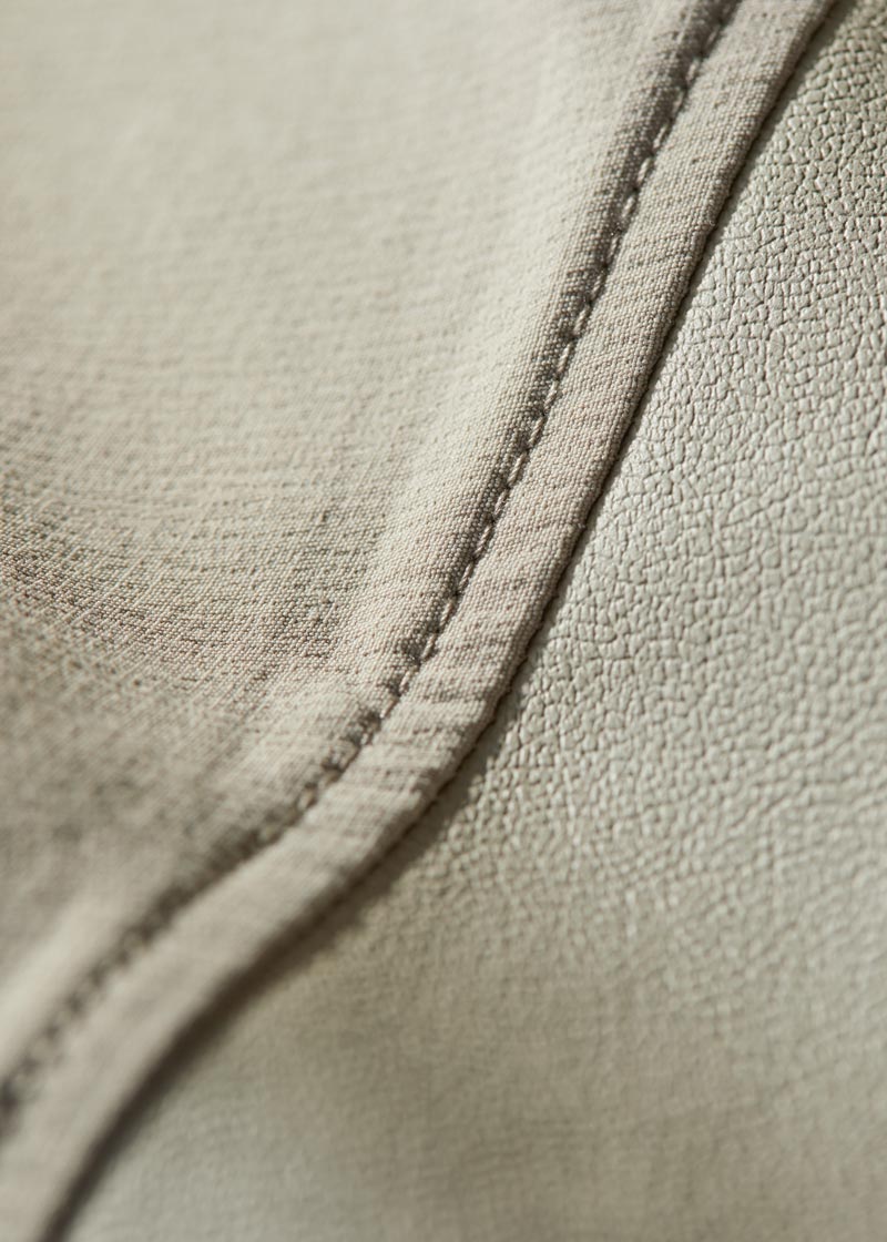 Close-up of the Dynamic™ Extreme stretch-woven fabric, emphasizing its lightweight, breathable, and durable properties