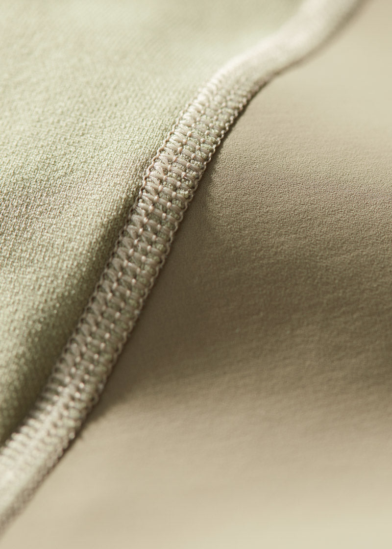 Detailed shot of the Durabreathe™ fabric, illustrating its lightweight, breathable nature designed to keep young riders comfortable during activities.