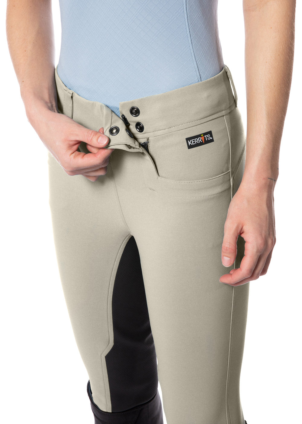 Side profile with the hidden zip closure and belt loops.