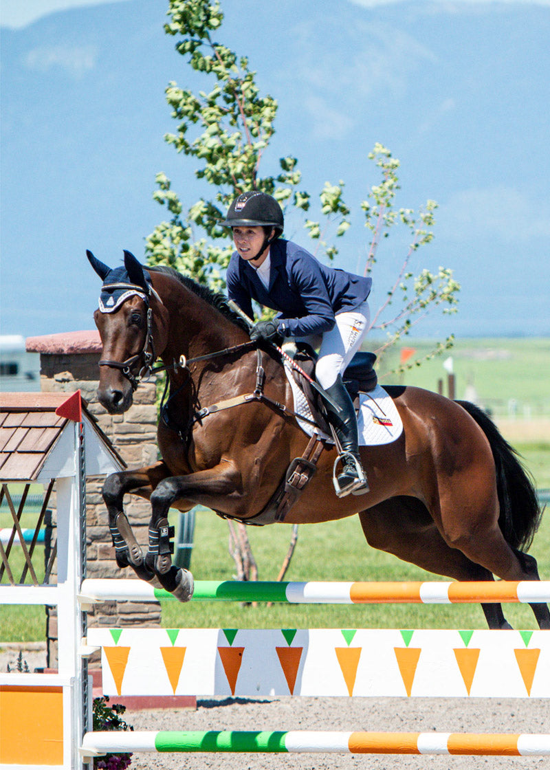 Individual wearing the coat in a competition setting, illustrating its suitability for show environments