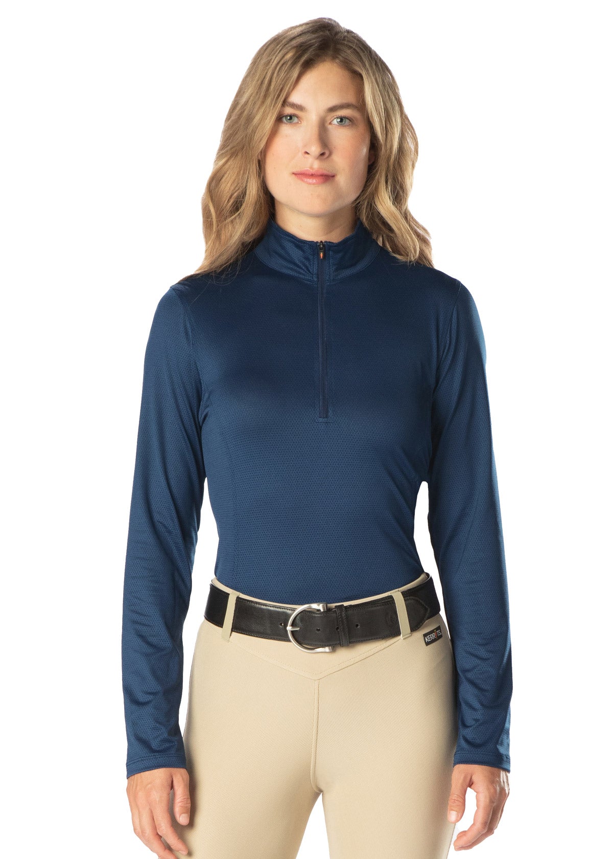 Model wearing the Kerrits Ice Fil® Lite Long Sleeve Riding Shirt in Navy, highlighting the sporty fit and zip collar.