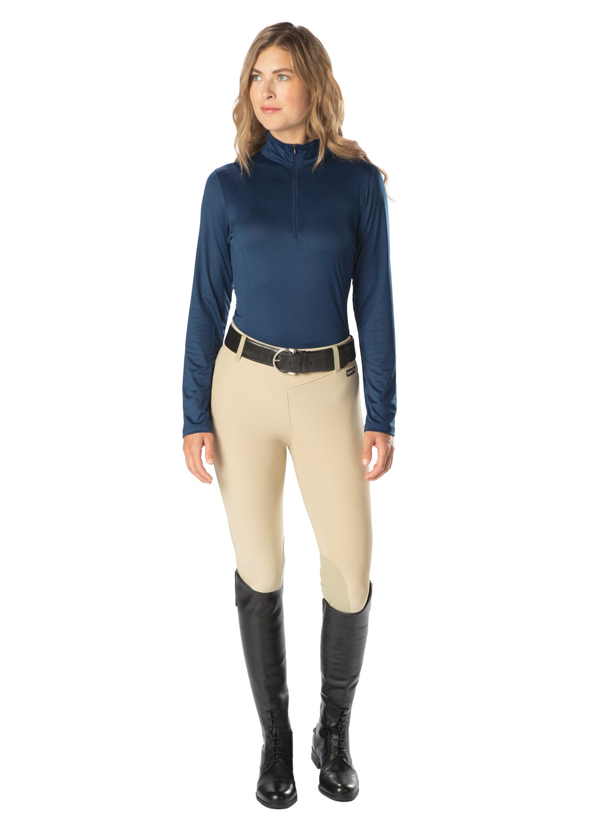 Model wearing the Kerrits Ice Fil® Lite Long Sleeve Riding Shirt in Navy highlighting the sporty fit and zip collar.