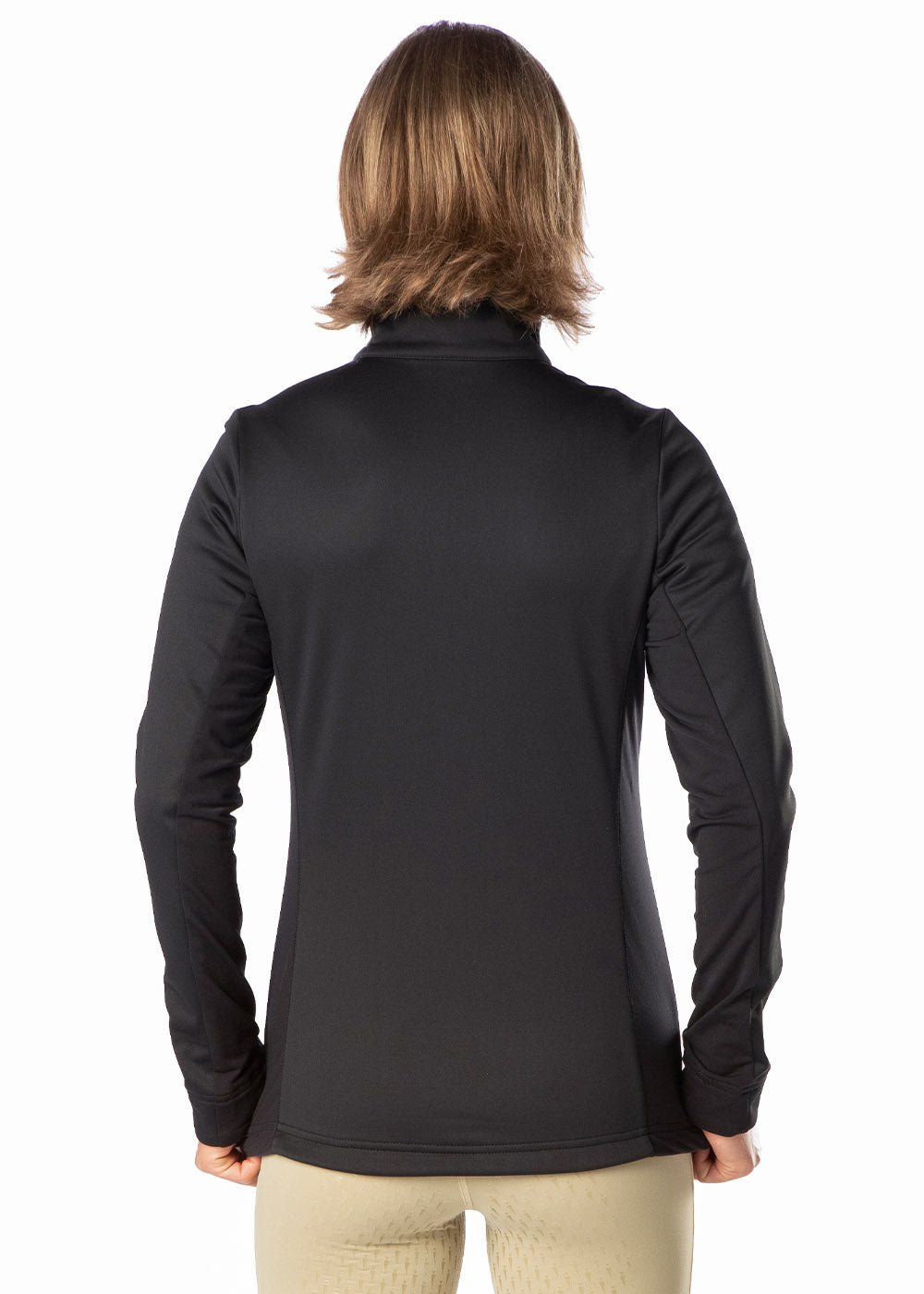 Back view on model highlighting the equestrian cut hem, designed to be shorter in the front and longer in the back for optimal in-saddle performance