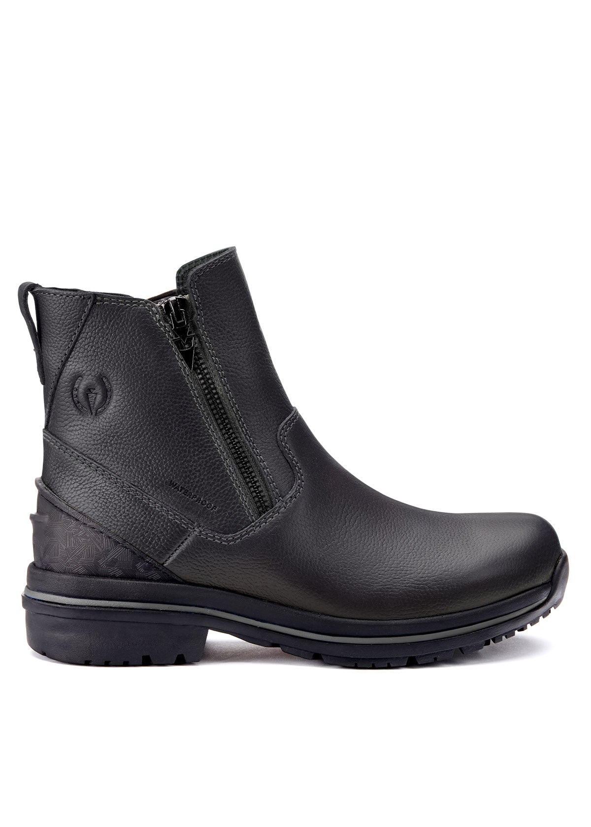 Side view of Woodstock Waterproof Barn Boot in black, showcasing 6-inch tall fitted shaft and contrast stitching
