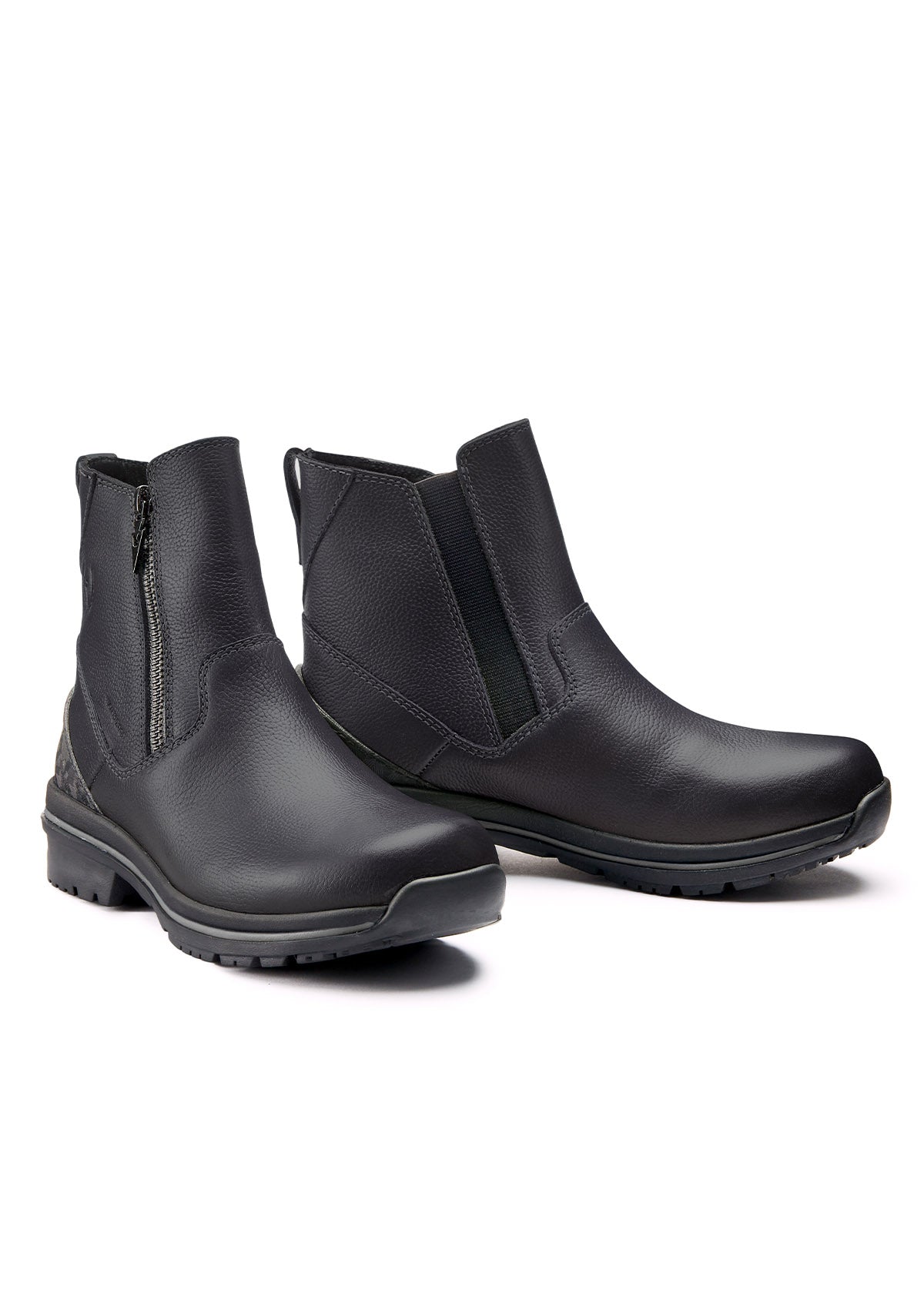 Side view of Woodstock Waterproof Barn Boot pair in black, showcasing 6-inch tall fitted shaft and contrast stitching