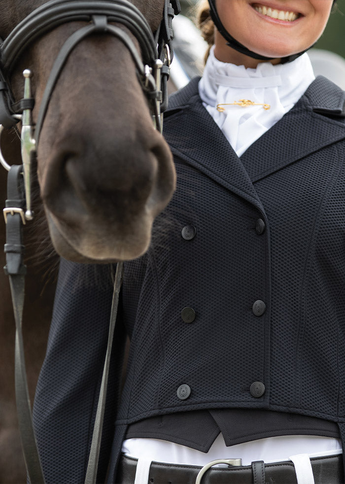 Detailed view of the textured 'no-see' Aero Mesh fabric on the black Affinity® Aero Shadbelly Show Coat, illustrating its lightweight and breathable qualities