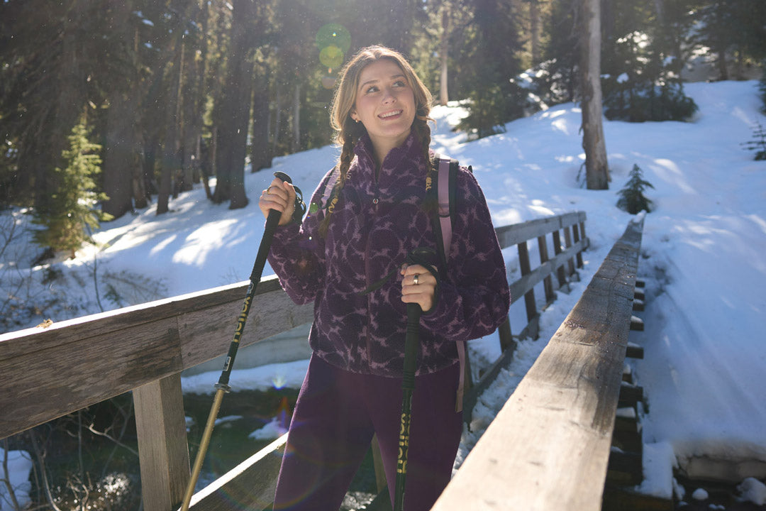 Two women hiking in the pacific northwest while wearing Kerrits activewear