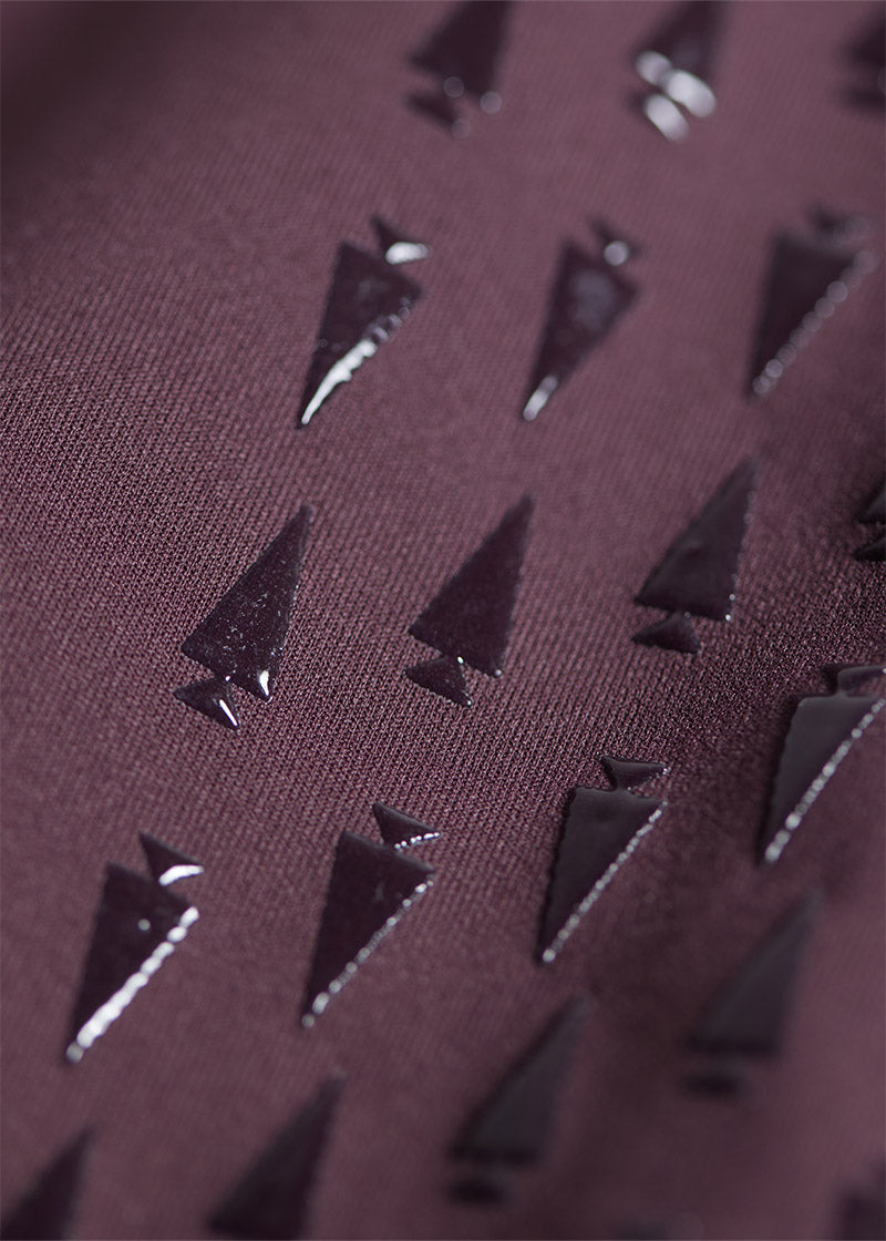 Close-up of the Coolcore® Stretch Interlock fabric, emphasizing its chemical-free fibers engineered to manage and quickly distribute moisture and body heat through thermo-controlled evaporation