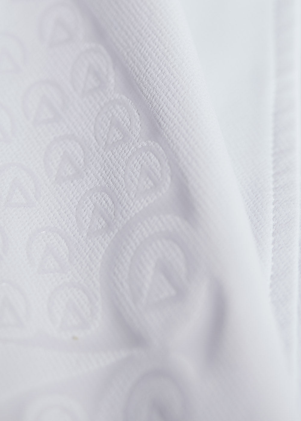 Detailed view of the Affinity® Silicone knee patch on the breech, providing flexible, breathable grip.