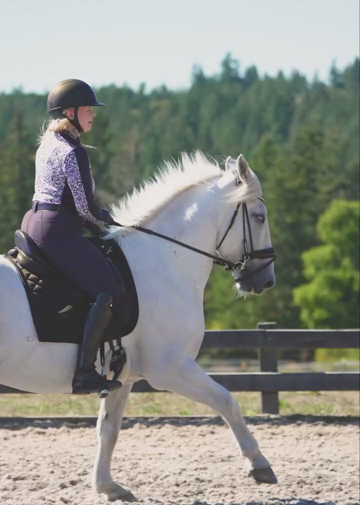 Video of a rider wearing the K-Flex Full Seat Breech, showing the breech in use. 